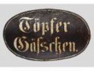 Plechová tabule s označením ulice "Töpfer Gaschen"